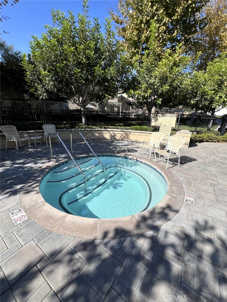 14101 Visions Drive La Mirada, CA 90638 - Photo 24 of 26 a view of a swimming pool with a patio