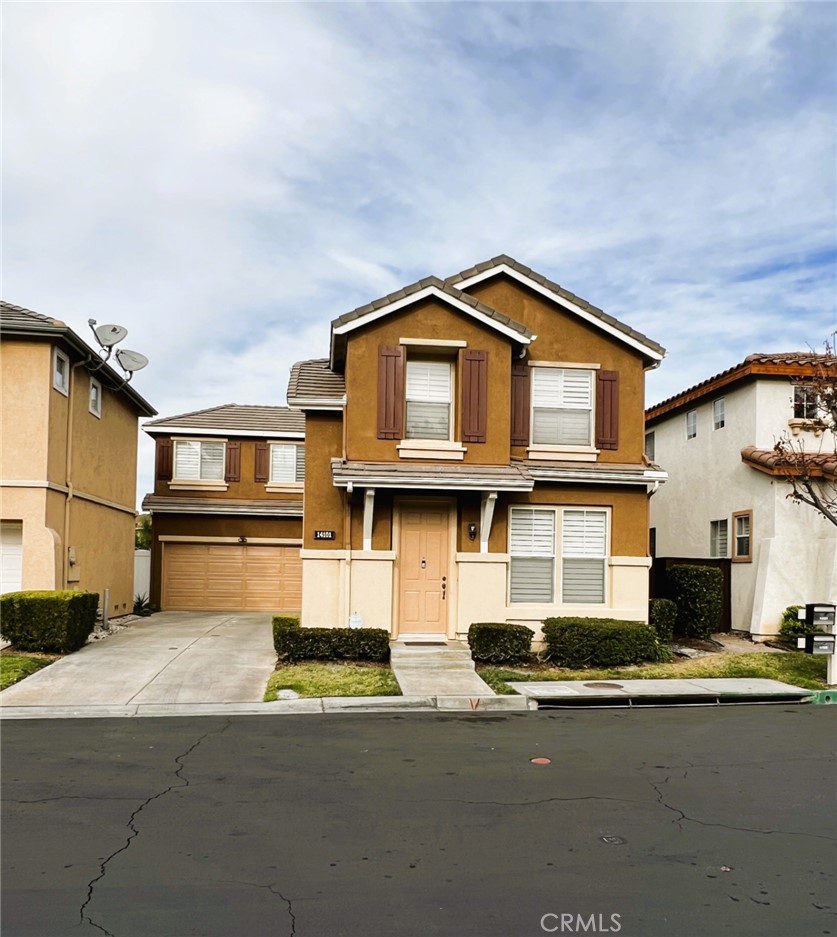 14101 Visions Drive La Mirada, CA 90638 - Photo 3 of 26 a front view of a house with yard