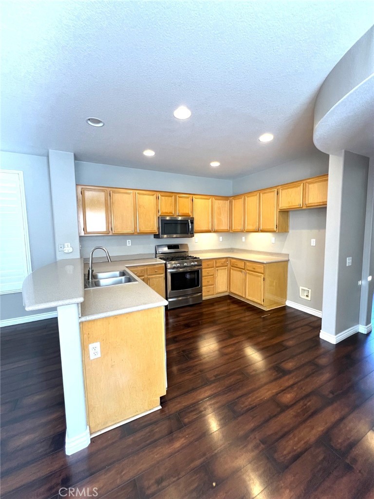 14101 Visions Drive La Mirada, CA 90638 - Photo 6 of 26 a view of a kitchen with wooden floor