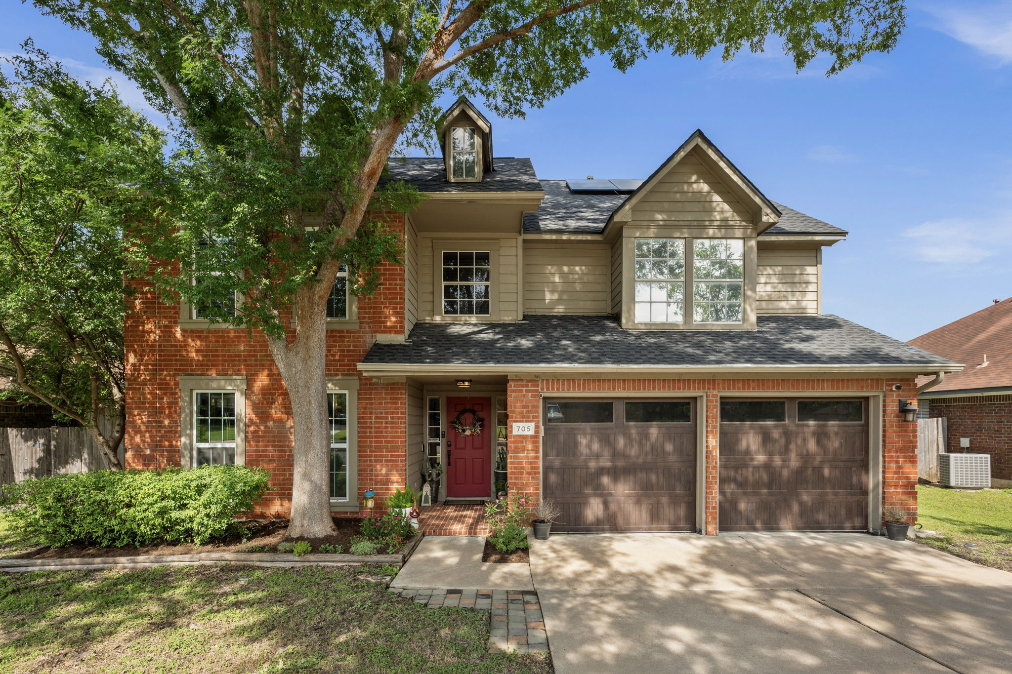 705 Canyon Bend Road Pflugerville, TX 78660 - Photo 1 of 23 a front view of a house with a yard