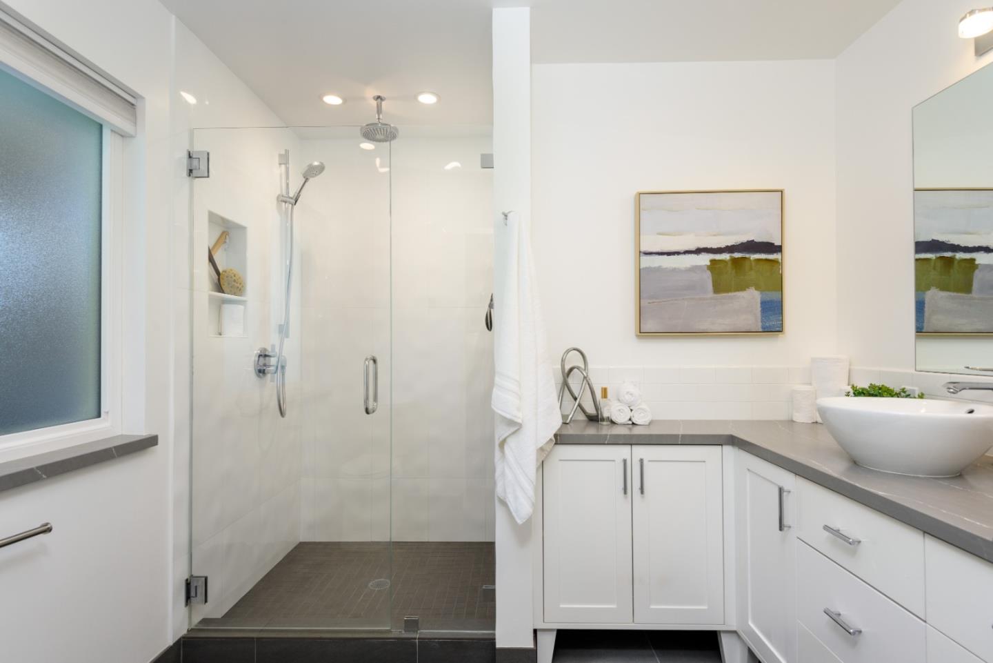 1990 Los Altos Drive San Mateo, CA 94402 - Photo 13 of 34 a bathroom with a shower sink and mirror