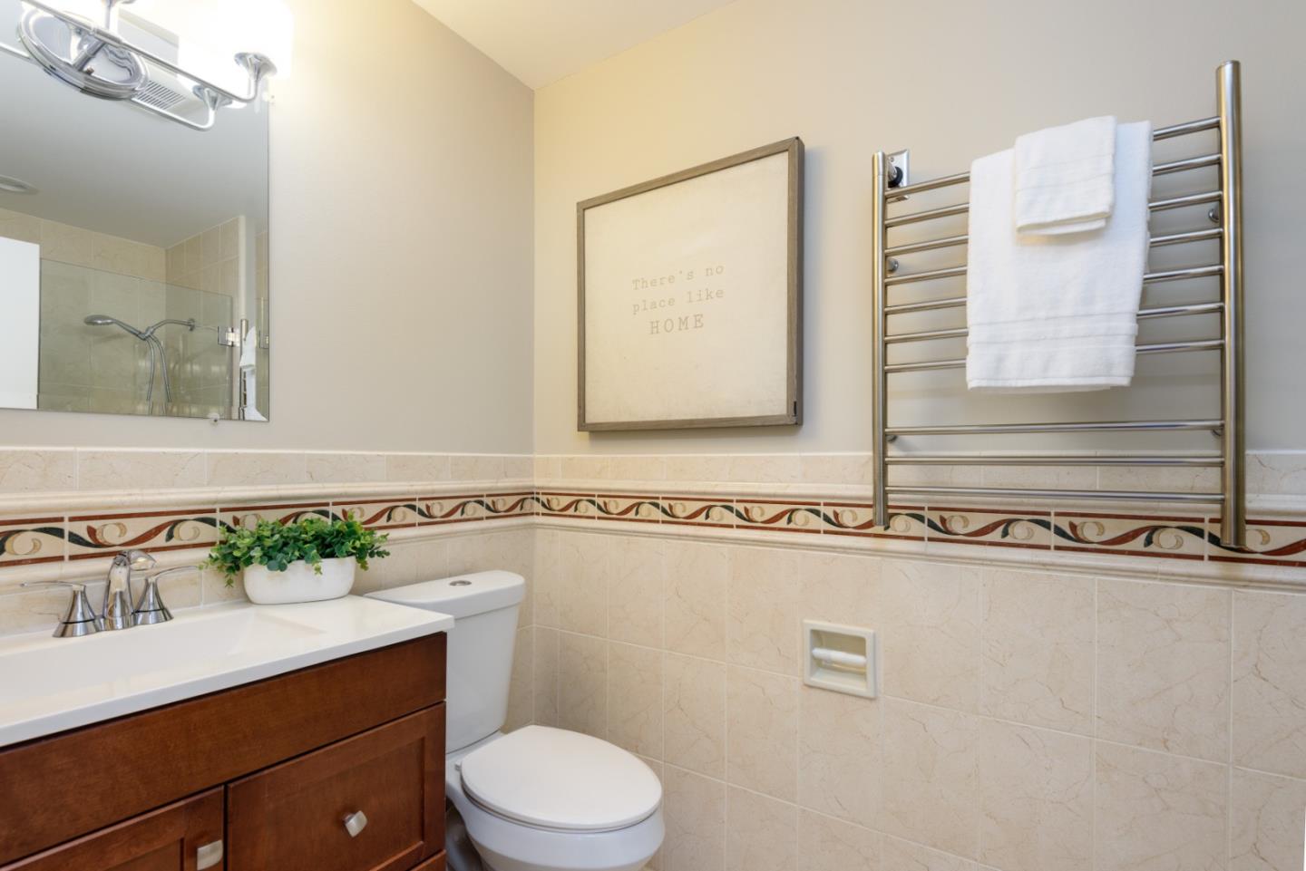 1990 Los Altos Drive San Mateo, CA 94402 - Photo 17 of 34 a bathroom with a sink mirror vanity and toilet