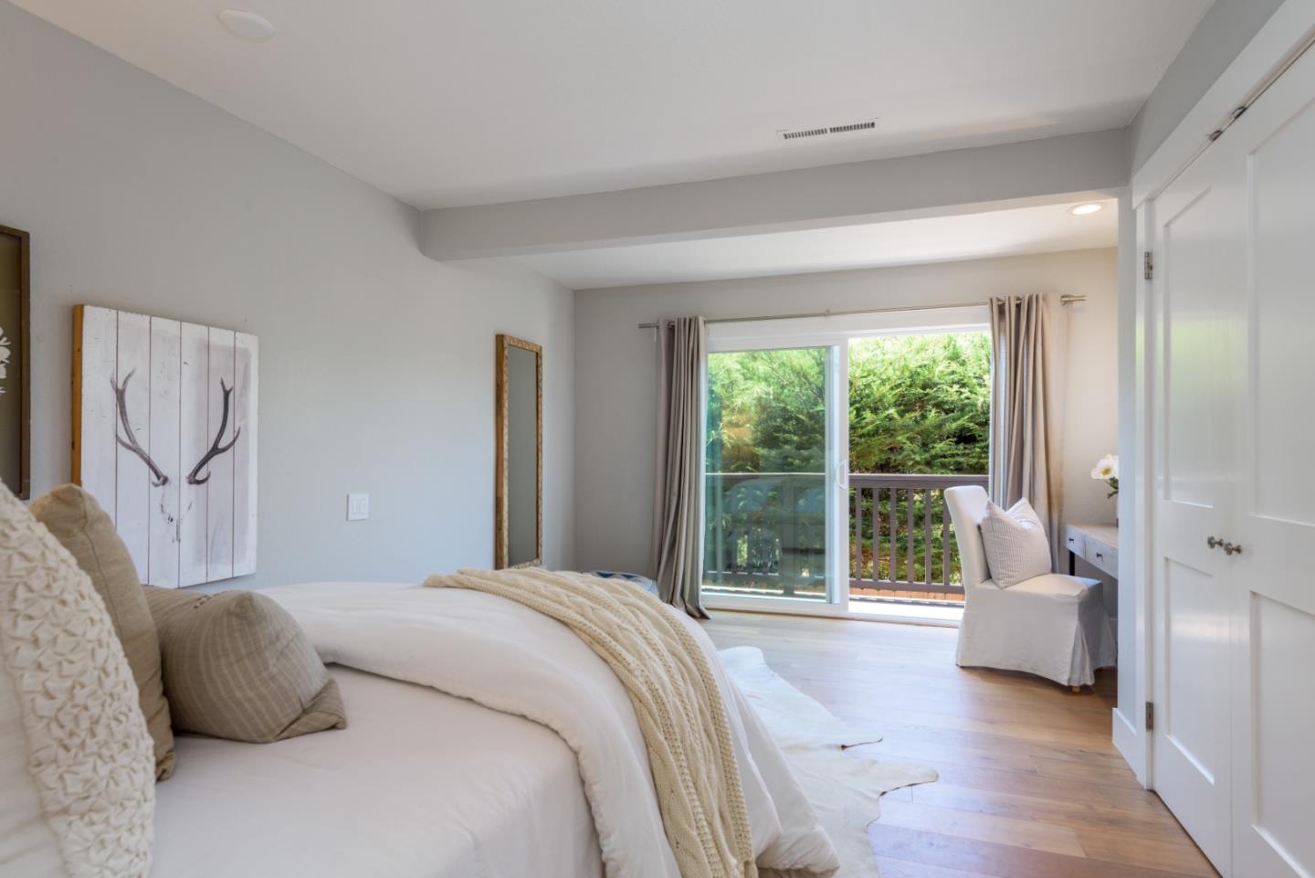 1990 Los Altos Drive San Mateo, CA 94402 - Photo 19 of 34 a bedroom with a large bed and a large window