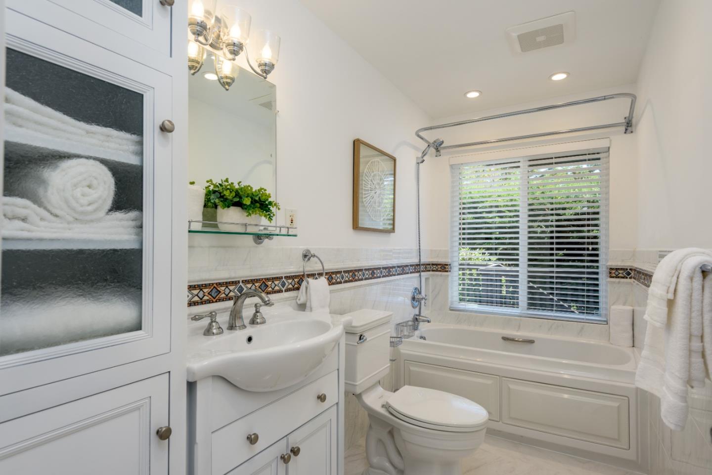 1990 Los Altos Drive San Mateo, CA 94402 - Photo 20 of 34 a bathroom with a sink a toilet and a bathtub