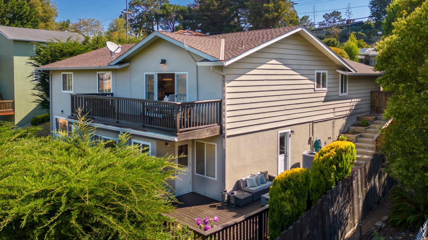 1990 Los Altos Drive San Mateo, CA 94402 - Photo 29 of 34 a view of house with wooden fence and potted plants