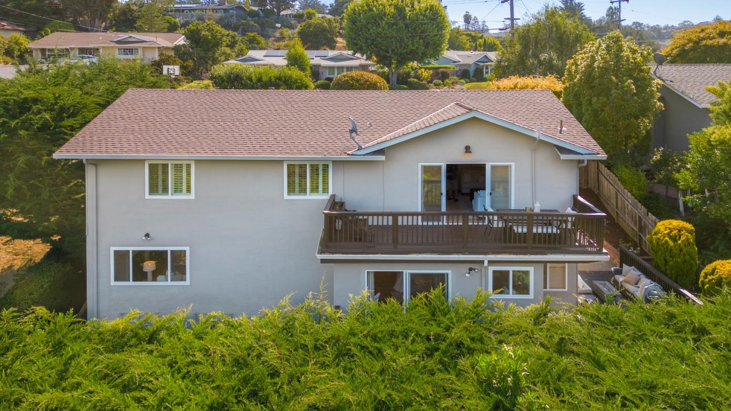 1990 Los Altos Drive San Mateo, CA 94402 - Photo 31 of 34 a aerial view of a house next to a yard