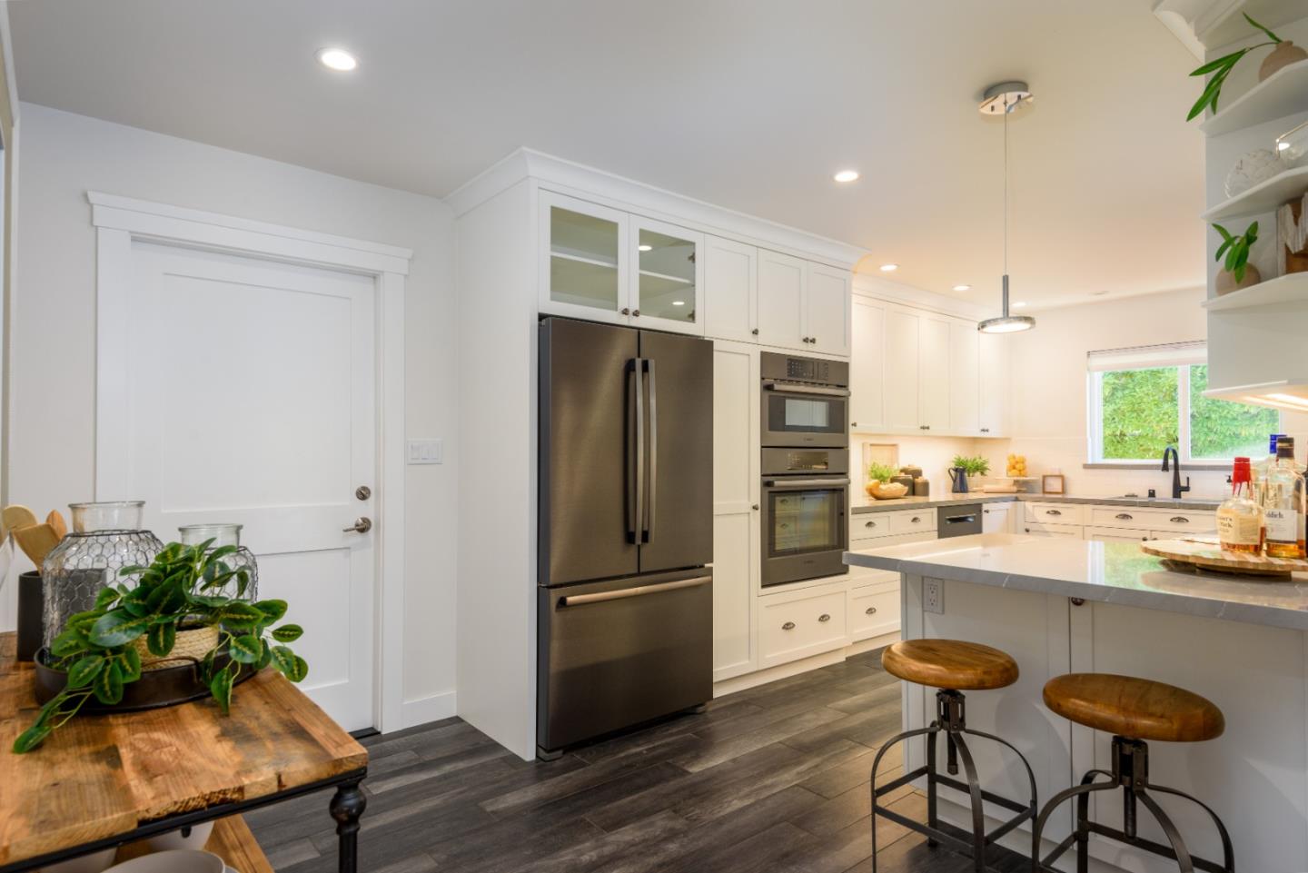1990 Los Altos Drive San Mateo, CA 94402 - Photo 5 of 34 a kitchen with a refrigerator and a chair