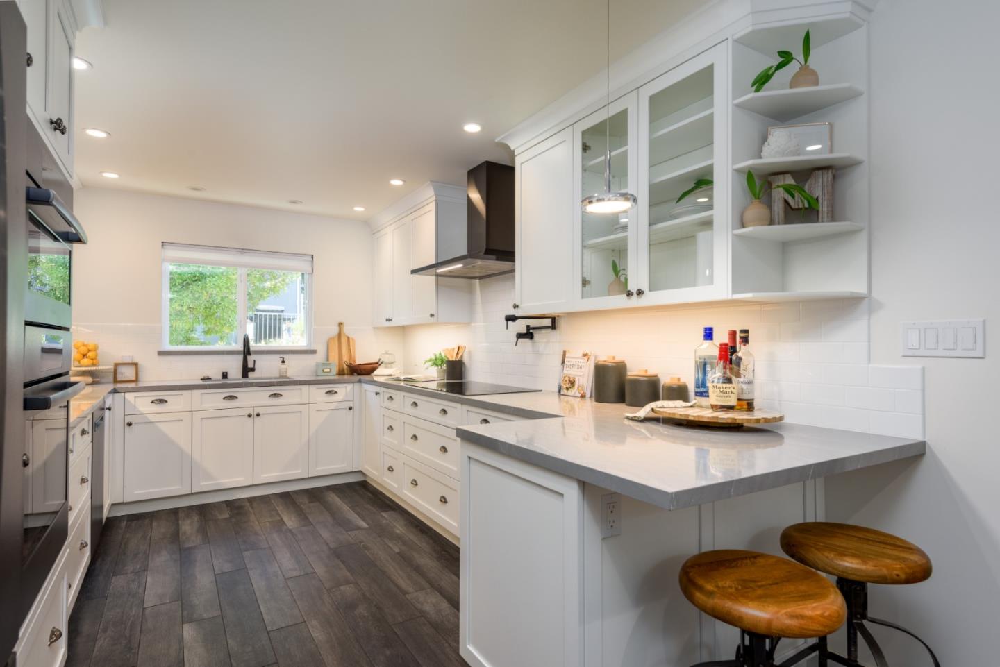 1990 Los Altos Drive San Mateo, CA 94402 - Photo 6 of 34 a kitchen with a sink cabinets and wooden floor