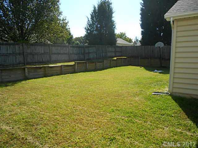 906 Treasure Place Southwest Concord, NC 28025 - Photo 14 of 15 a view of a backyard