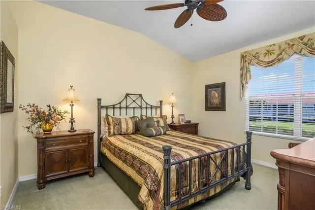 a bathroom with a granite countertop sink mirror and double