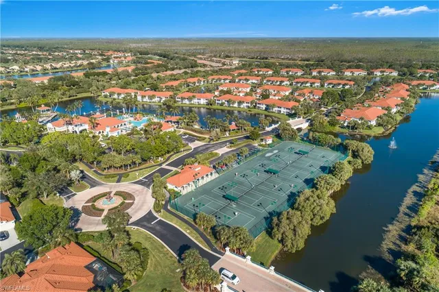 an aerial view of lake residential houses with outdoor space