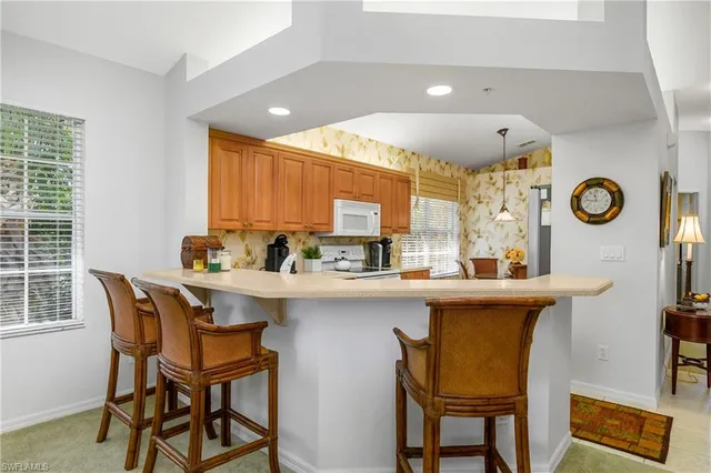 a view of a table and chairs in the patio