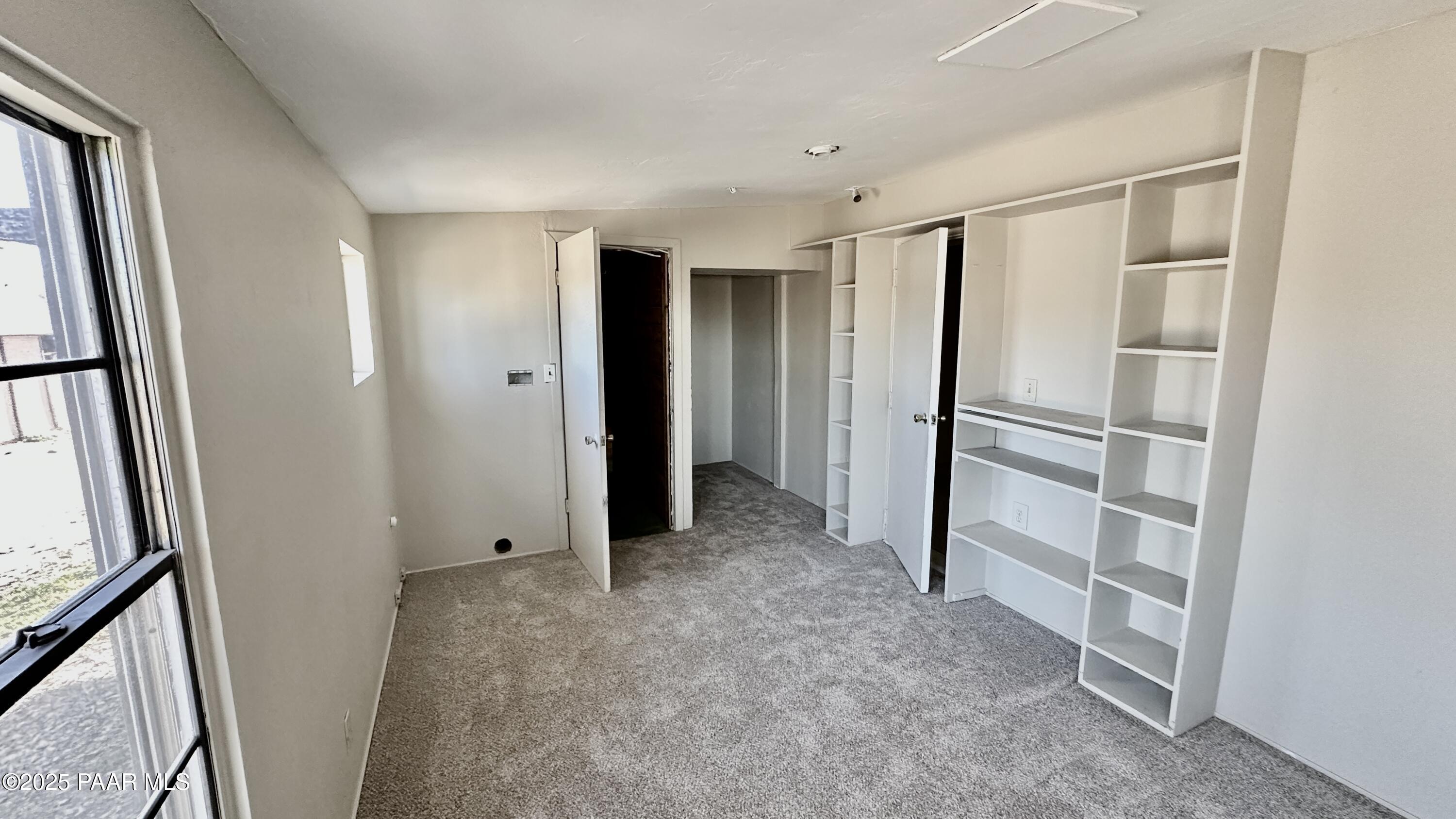 1331 East Red Cinder Road Chino Valley, AZ 86323 - Photo 17 of 58 a view of entryway with stairs and wooden floor