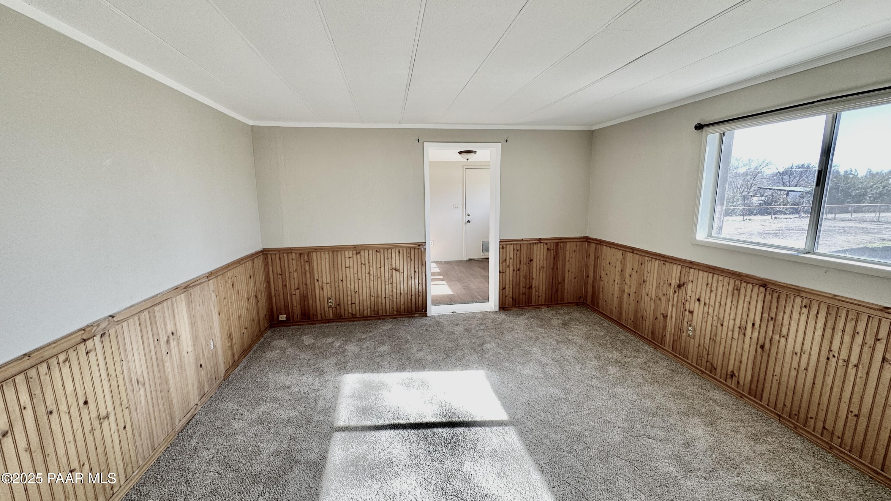 1331 East Red Cinder Road Chino Valley, AZ 86323 - Photo 25 of 58 a view of hallway with wooden floor and stairs