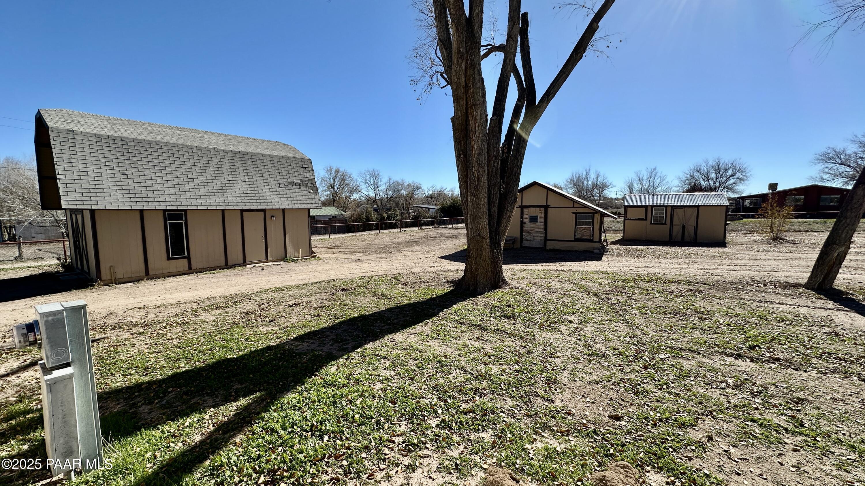 1331 East Red Cinder Road Chino Valley, AZ 86323 - Photo 52 of 58 a view of a house with a yard