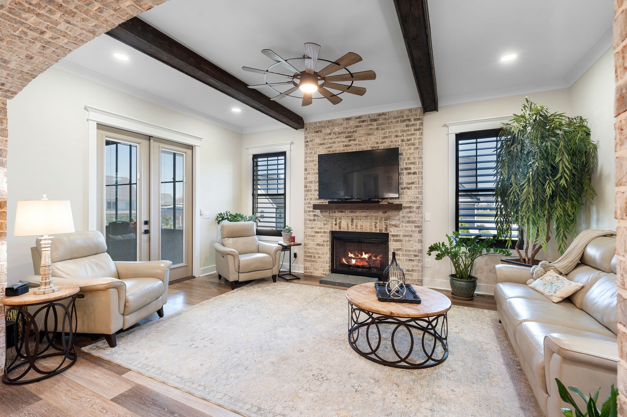 49 Why Worry Lane Winchester, TN 37398 - Photo 20 of 67 a living room with furniture potted plant and a fireplace