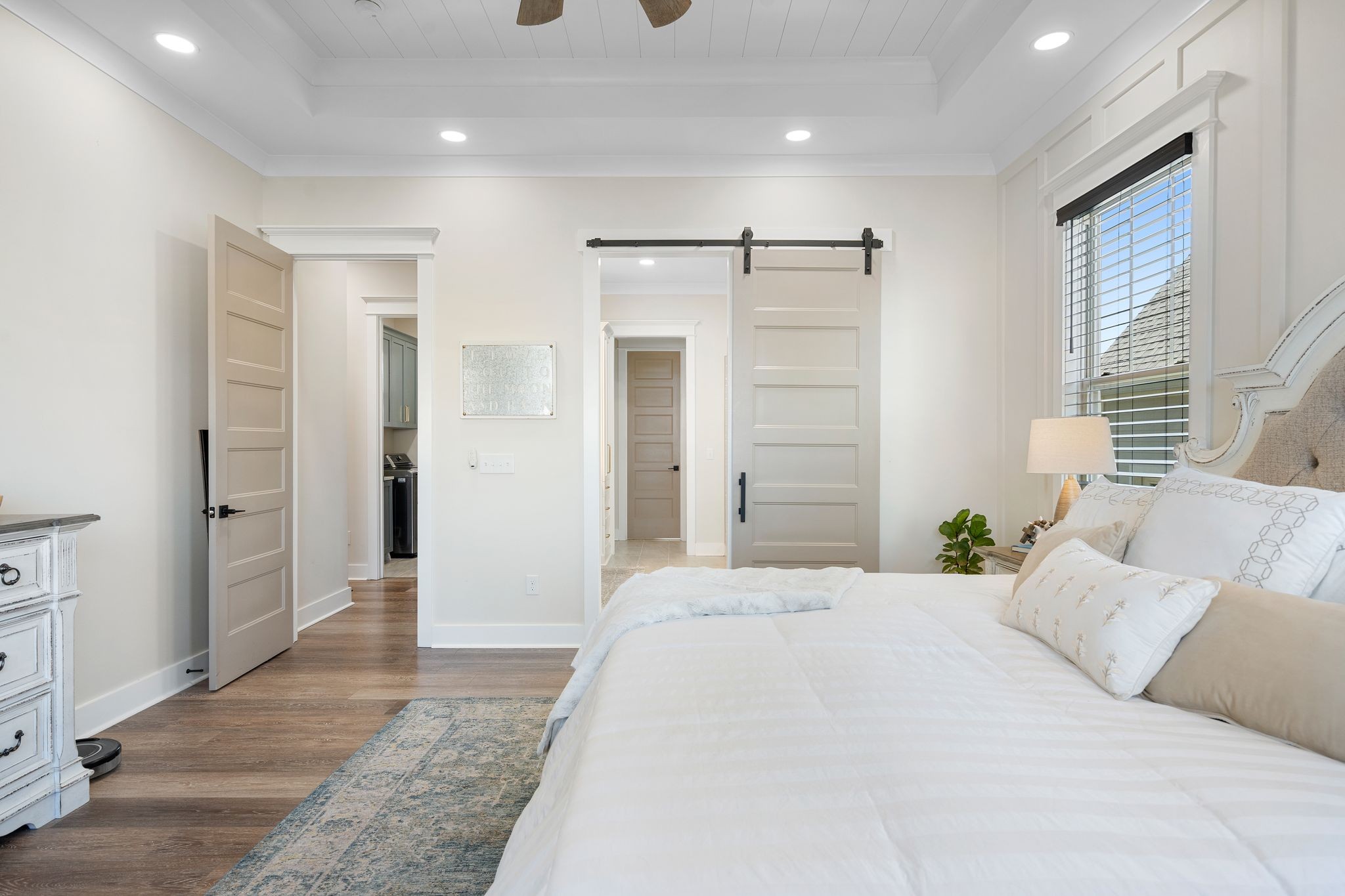 49 Why Worry Lane Winchester, TN 37398 - Photo 24 of 67 a bedroom with a large bed a walk in closet and a bathroom