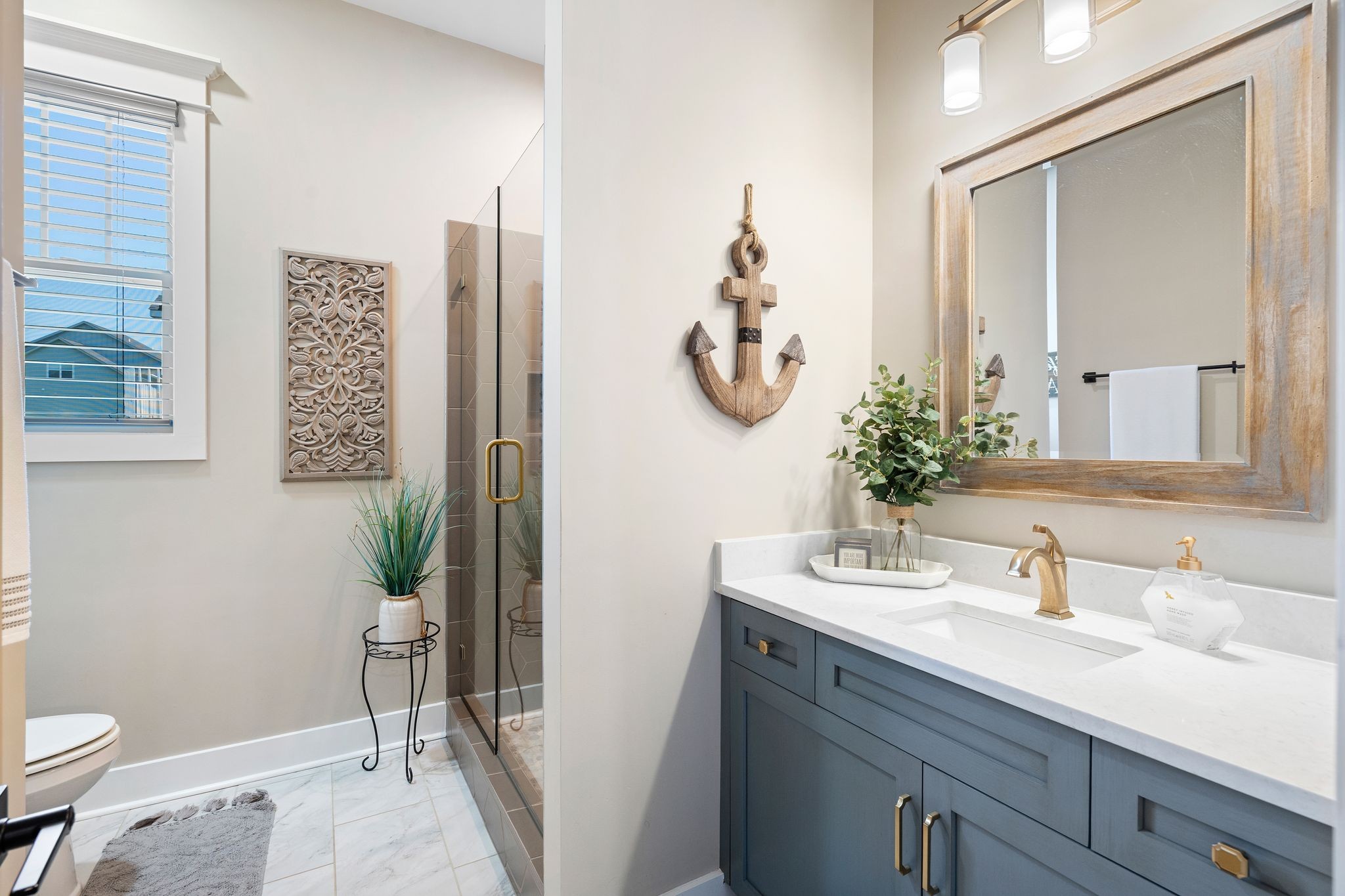 49 Why Worry Lane Winchester, TN 37398 - Photo 31 of 67 a bathroom with a granite countertop sink a toilet and mirror