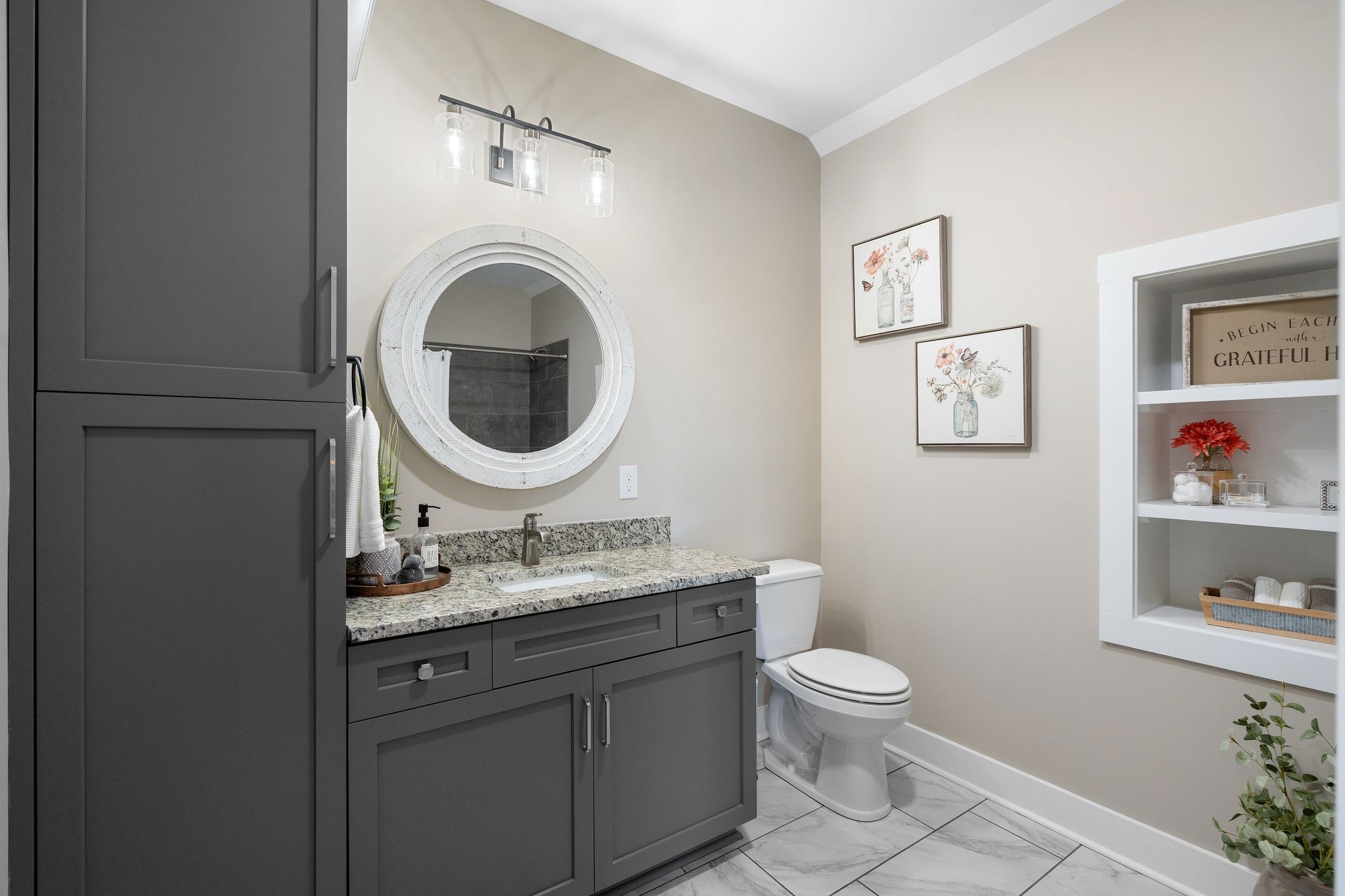 49 Why Worry Lane Winchester, TN 37398 - Photo 41 of 67 a bathroom with a granite countertop toilet a sink and a mirror