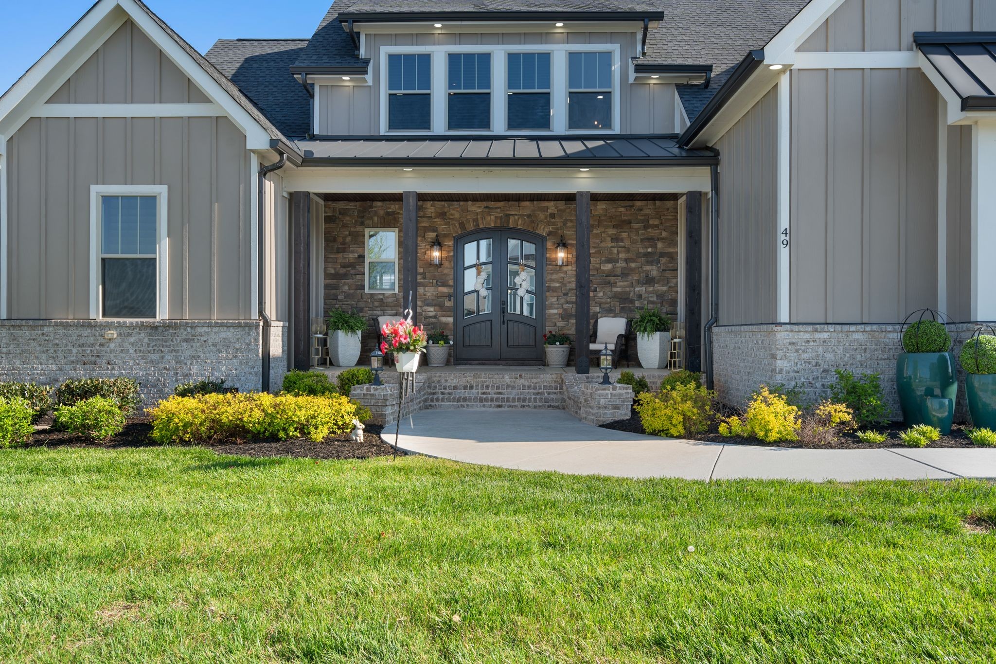 49 Why Worry Lane Winchester, TN 37398 - Photo 5 of 67 a front view of a house with a yard and seating space