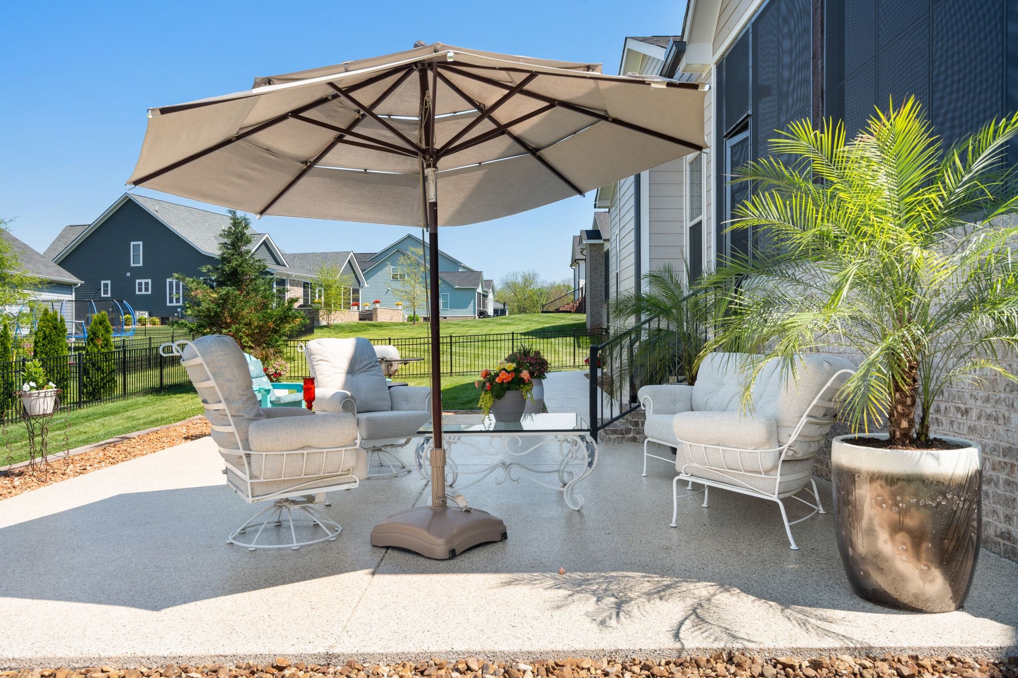 49 Why Worry Lane Winchester, TN 37398 - Photo 51 of 67 a view of a patio with table and chairs under an umbrella