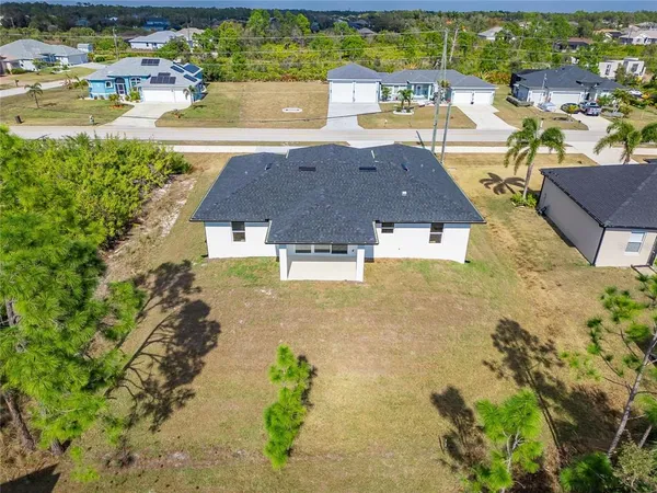 a view of kitchen with wooden floor and window