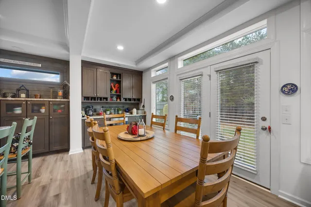 a kitchen with an oven a cabinets and a window