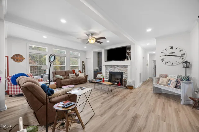 a kitchen with kitchen island granite countertop lots of counter top space a sink and stainless steel appliances