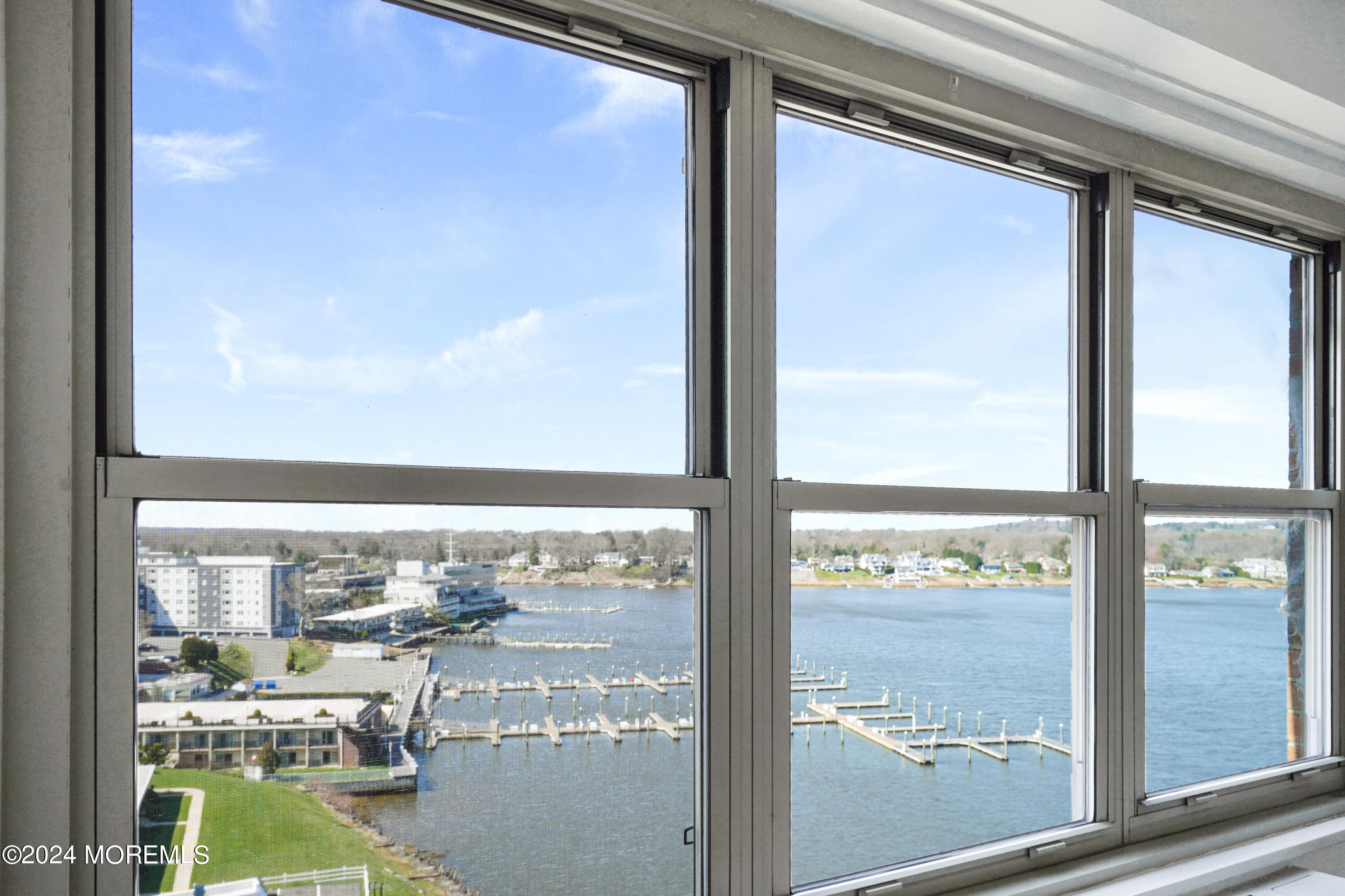 28 Riverside Avenue, Unit 8N Red Bank, NJ 07701 - Photo 2 of 30 a view of a glass door with a chair