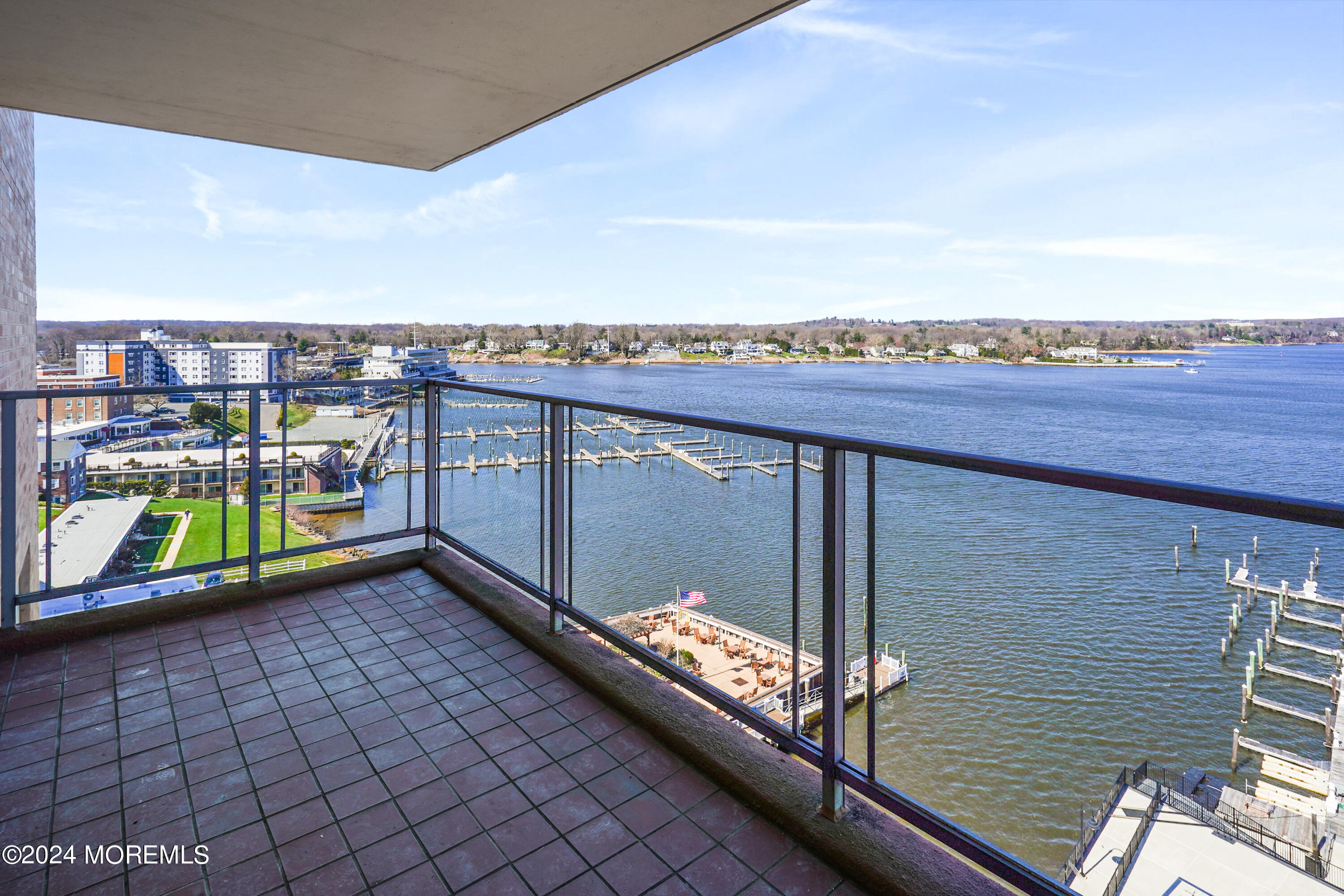 28 Riverside Avenue, Unit 8N Red Bank, NJ 07701 - Photo 23 of 30 a view of a terrace with a bench