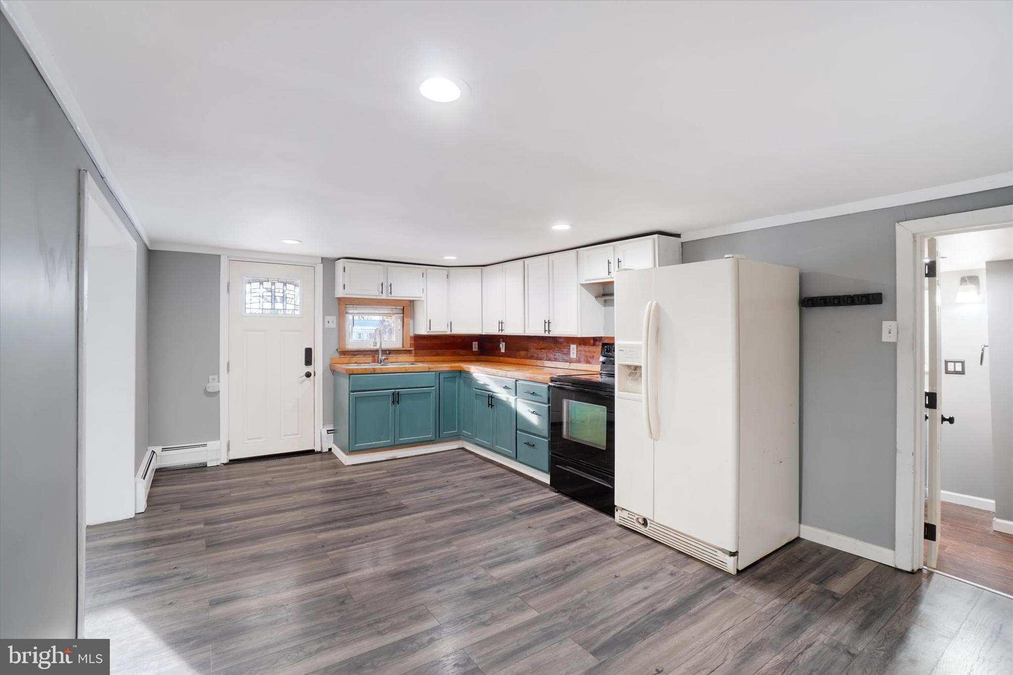 295 Cragmoor Road York Haven, PA 17370 - Photo 14 of 20 a kitchen with stainless steel appliances a refrigerator and a wooden floor