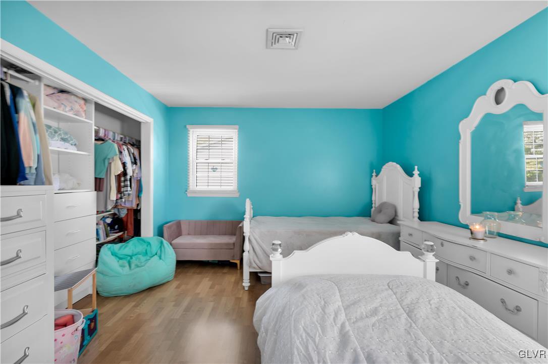 3248 Garrett Road Bethlehem, PA 18017 - Photo 14 of 40 a bedroom with a bed and a dresser