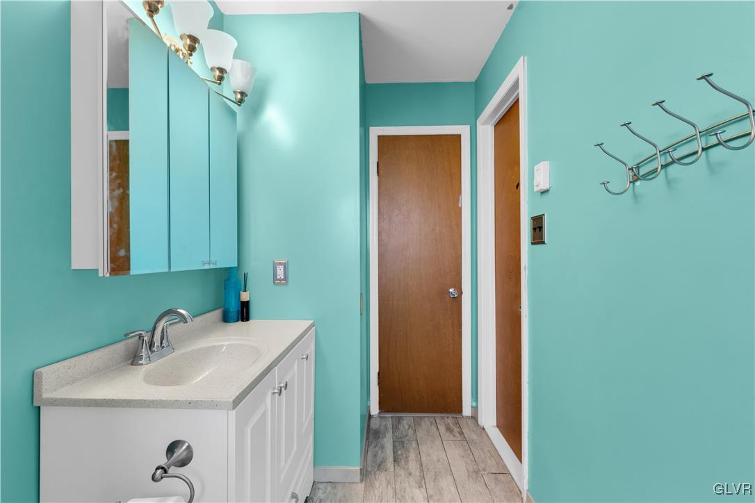 3248 Garrett Road Bethlehem, PA 18017 - Photo 17 of 40 a bathroom with a sink and a mirror