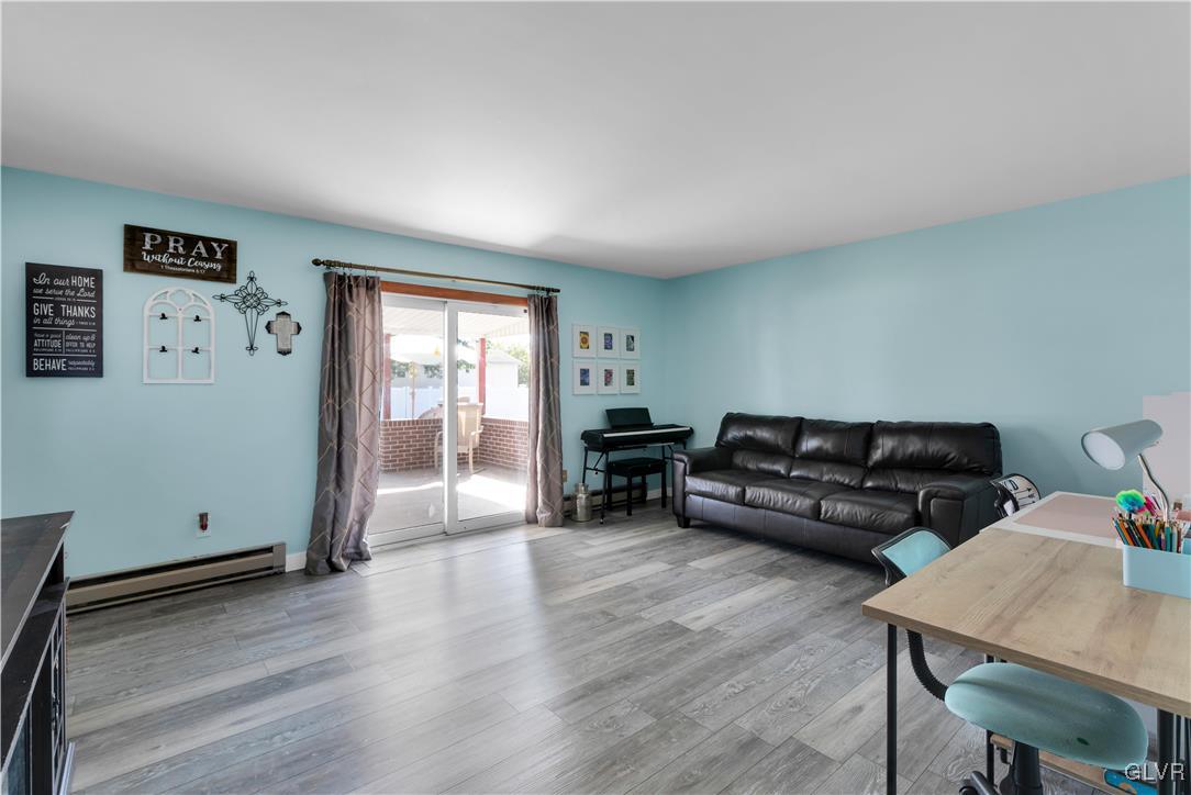 3248 Garrett Road Bethlehem, PA 18017 - Photo 18 of 40 a living room with furniture and wooden floor