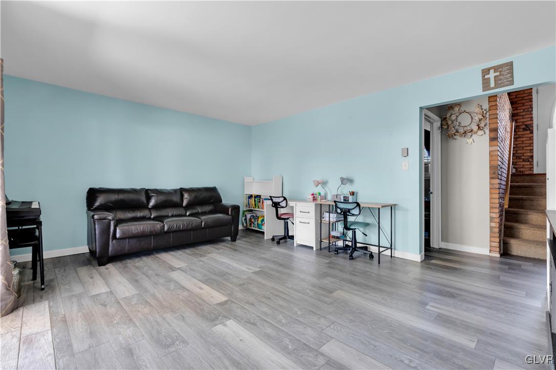 3248 Garrett Road Bethlehem, PA 18017 - Photo 20 of 40 a living room with furniture and a wooden floor
