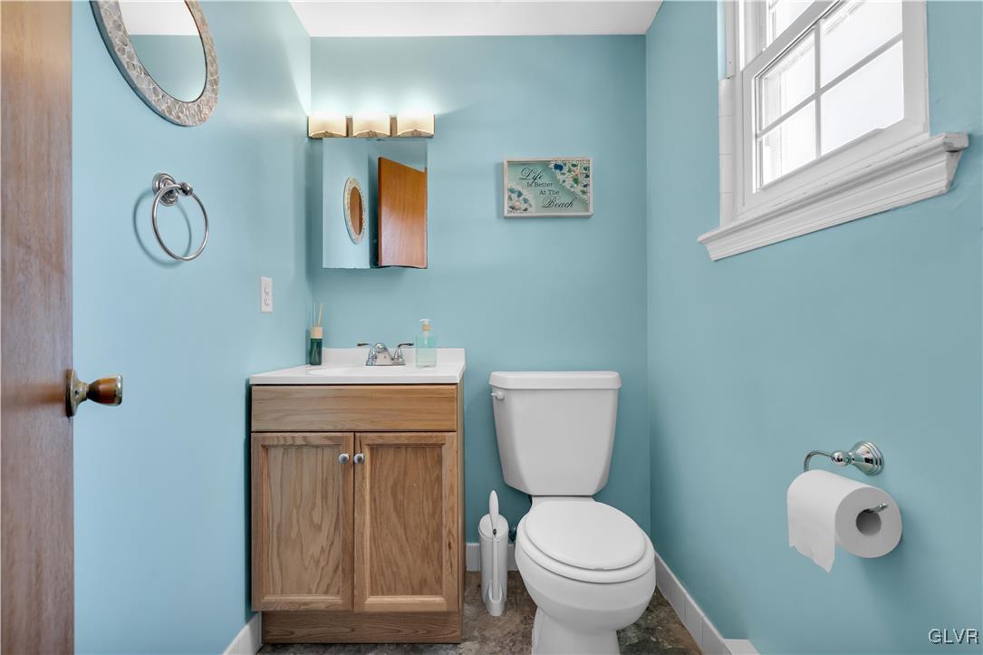 3248 Garrett Road Bethlehem, PA 18017 - Photo 24 of 40 a bathroom with a toilet sink and mirror
