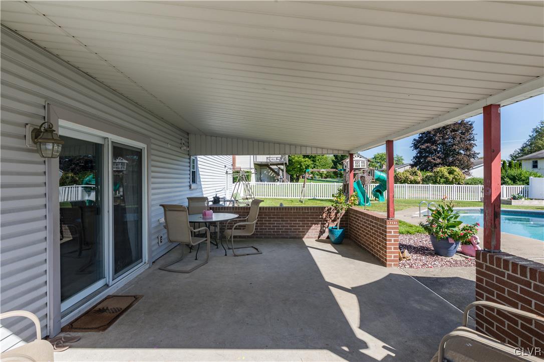 3248 Garrett Road Bethlehem, PA 18017 - Photo 29 of 40 a living room with patio furniture and a garden