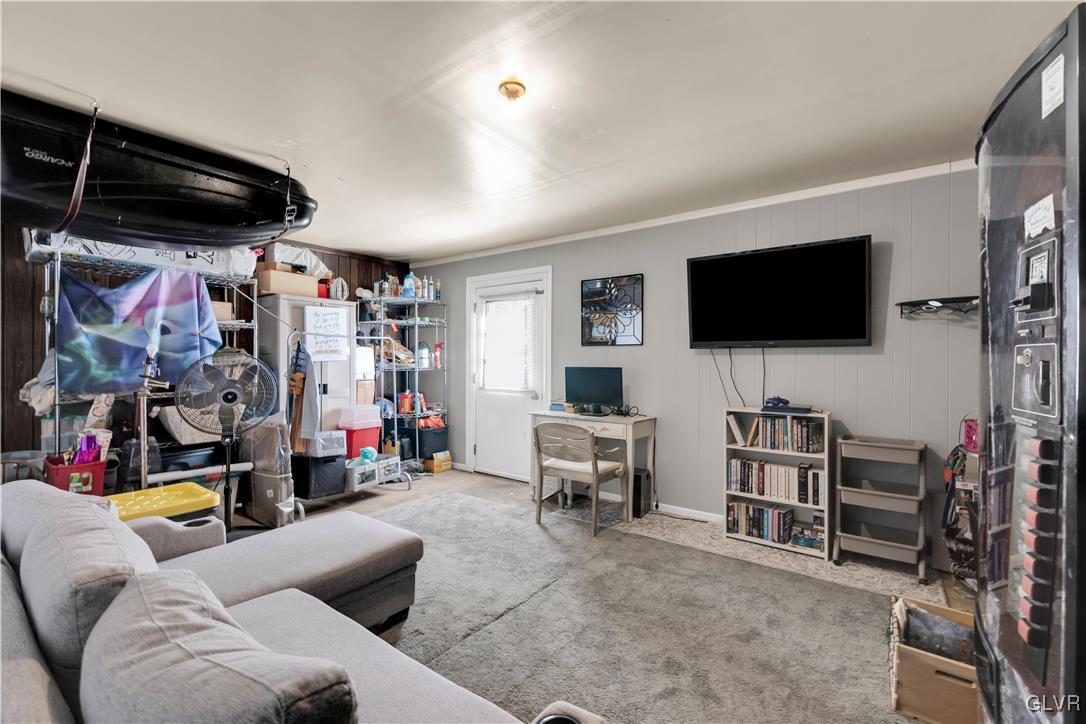 3248 Garrett Road Bethlehem, PA 18017 - Photo 35 of 40 a living room with lots of furniture and a flat screen tv