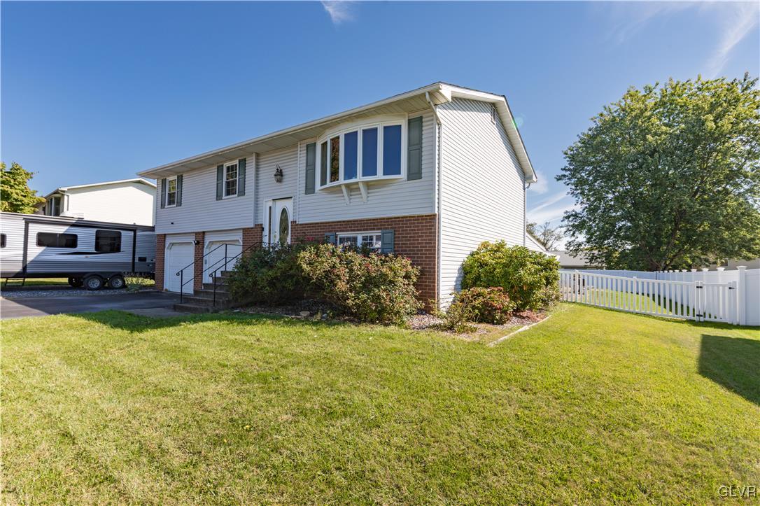 3248 Garrett Road Bethlehem, PA 18017 - Photo 36 of 40 a front view of house with yard and trees in the background