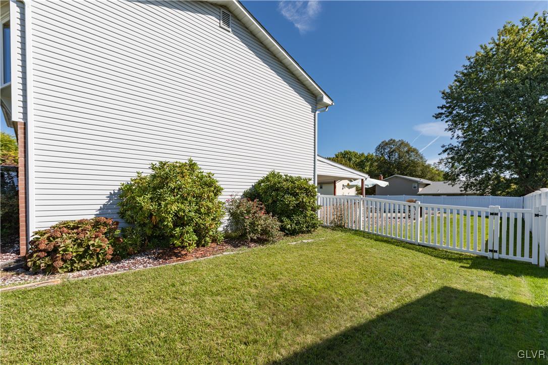 3248 Garrett Road Bethlehem, PA 18017 - Photo 37 of 40 a view of a backyard with plants and large trees