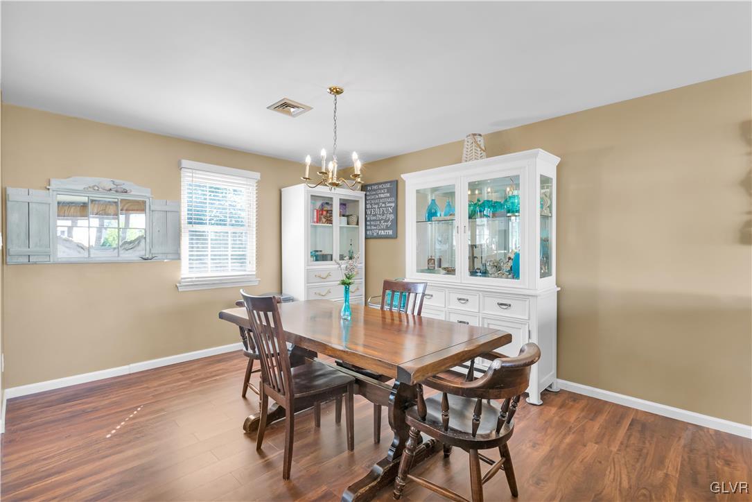 3248 Garrett Road Bethlehem, PA 18017 - Photo 6 of 40 a view of a dining room with furniture window and wooden floor