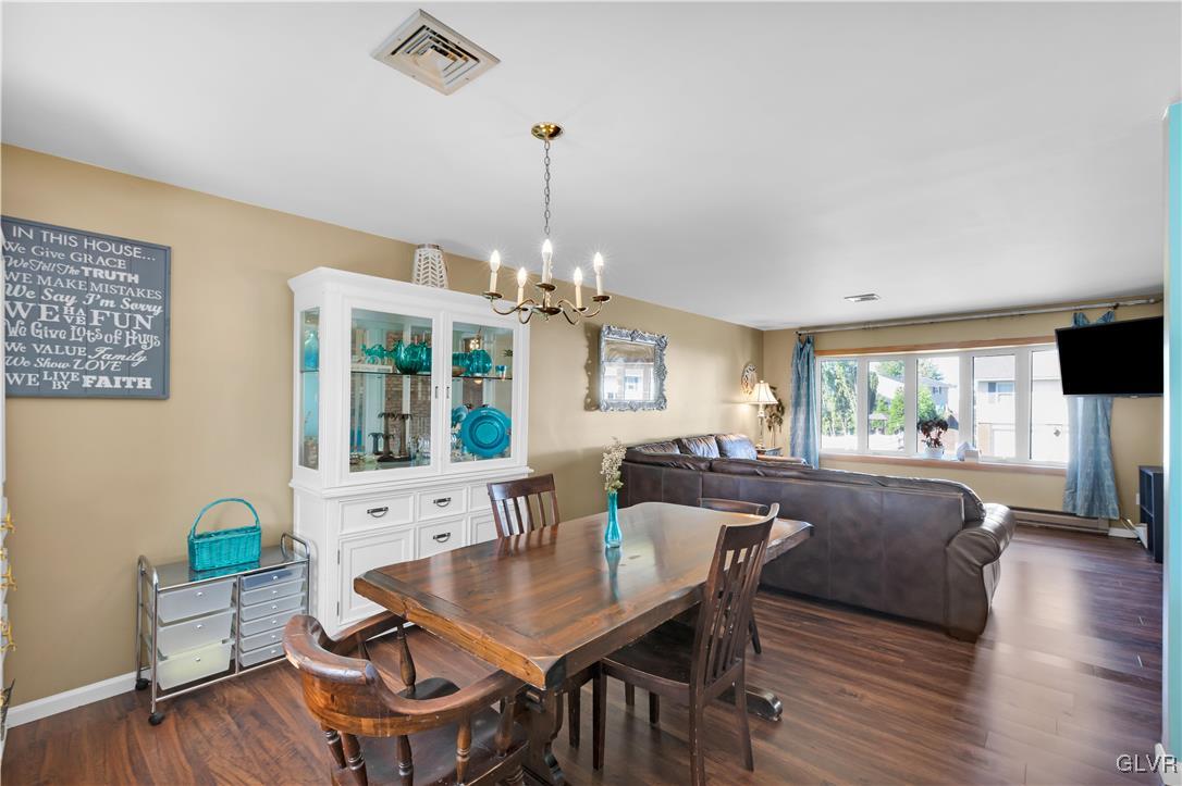 3248 Garrett Road Bethlehem, PA 18017 - Photo 7 of 40 a view of a dining room with furniture window and wooden floor