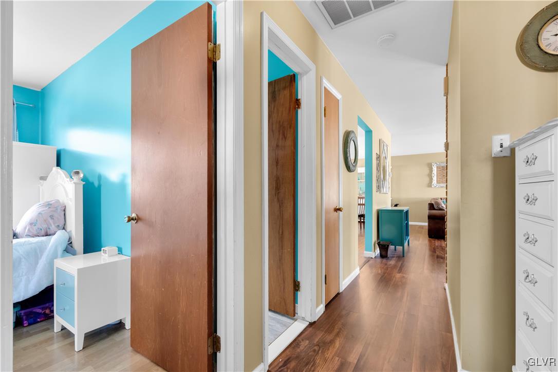 3248 Garrett Road Bethlehem, PA 18017 - Photo 10 of 40 a view of a hallway with bathroom and wooden floor