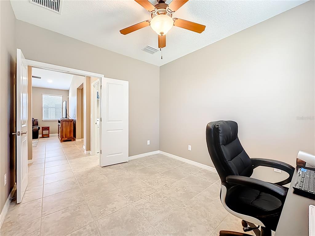 5647 Northwest 37th Lane Road Ocala, FL 34482 - Photo 19 of 50 a view of a livingroom with furniture and entryway
