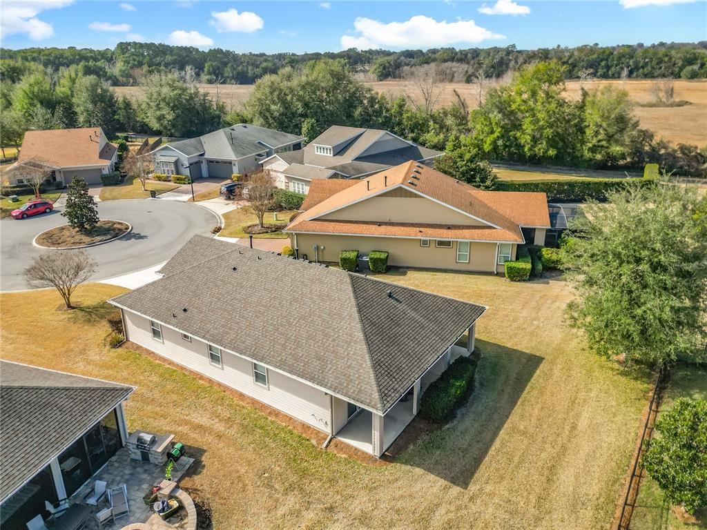 5647 Northwest 37th Lane Road Ocala, FL 34482 - Photo 24 of 50 a view of a swimming pool with a patio