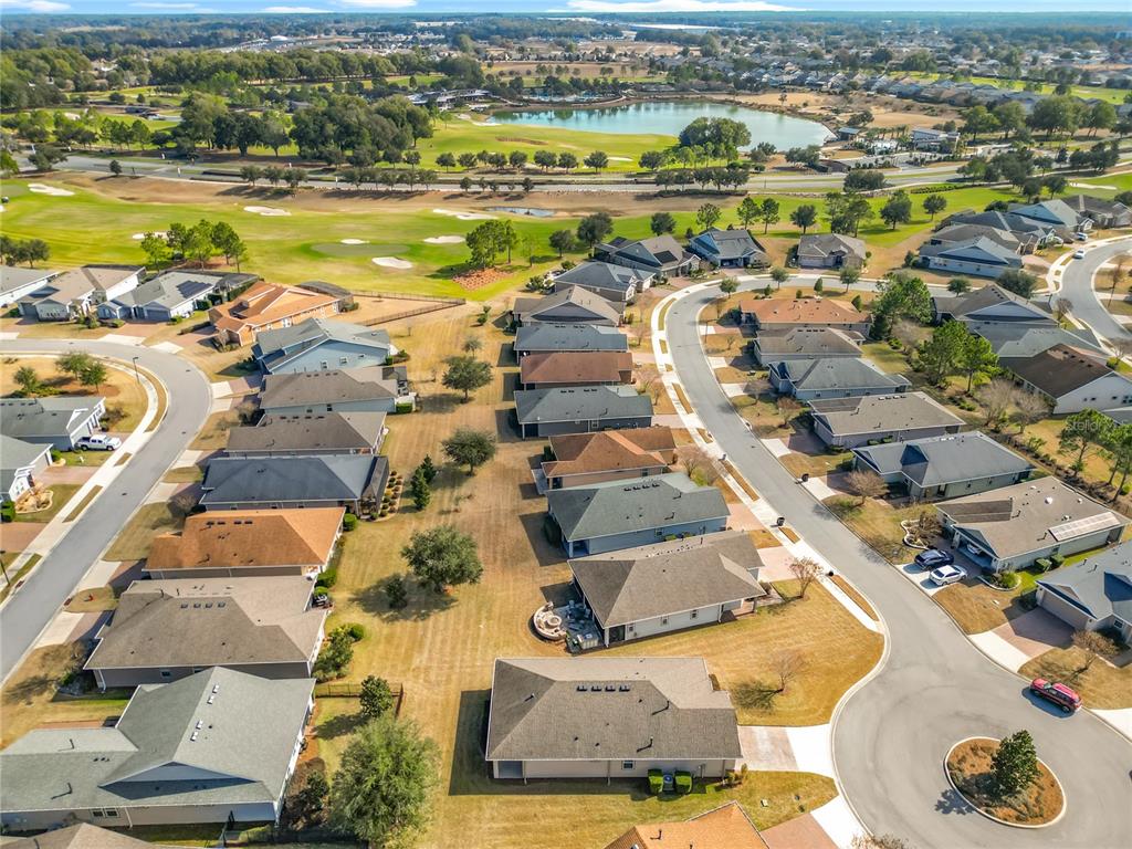5647 Northwest 37th Lane Road Ocala, FL 34482 - Photo 26 of 50 an aerial view of residential houses with outdoor space