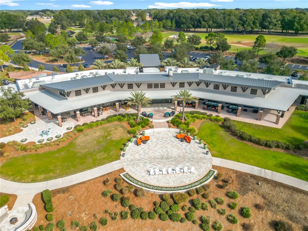 5647 Northwest 37th Lane Road Ocala, FL 34482 - Photo 33 of 50 an aerial view of a house with a swimming pool
