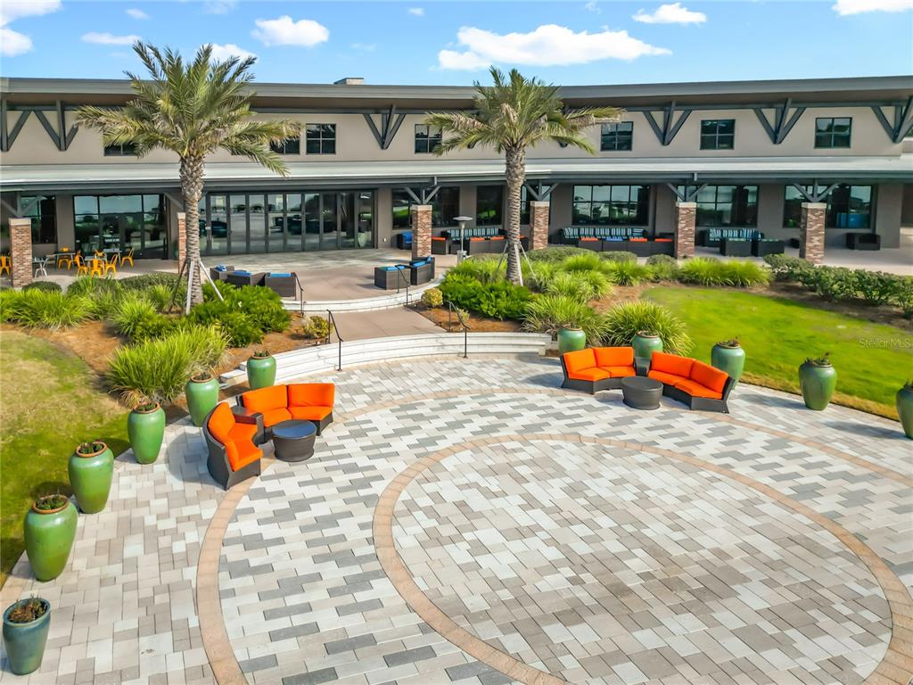 5647 Northwest 37th Lane Road Ocala, FL 34482 - Photo 34 of 50 a front view of a building with swimming pool