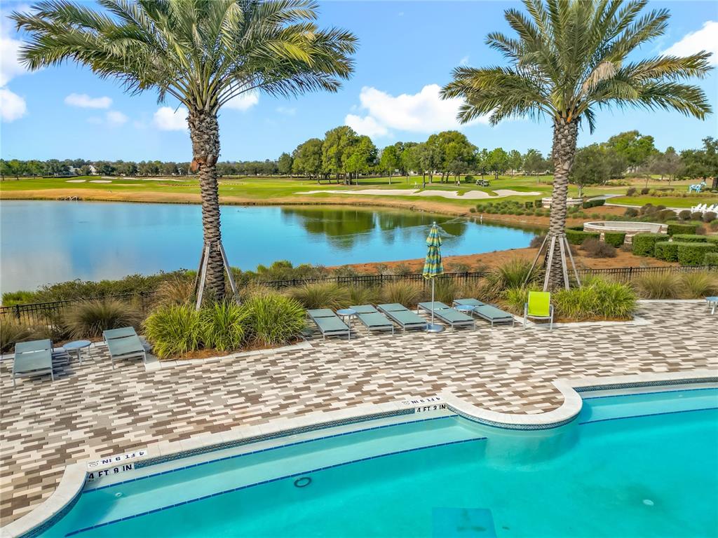 5647 Northwest 37th Lane Road Ocala, FL 34482 - Photo 38 of 50 a view of a lake with a beach