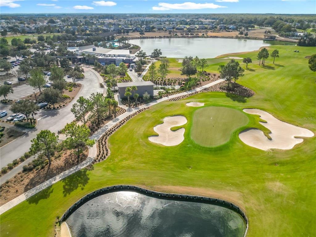 5647 Northwest 37th Lane Road Ocala, FL 34482 - Photo 49 of 50 an aerial view of a swimming pool with a yard